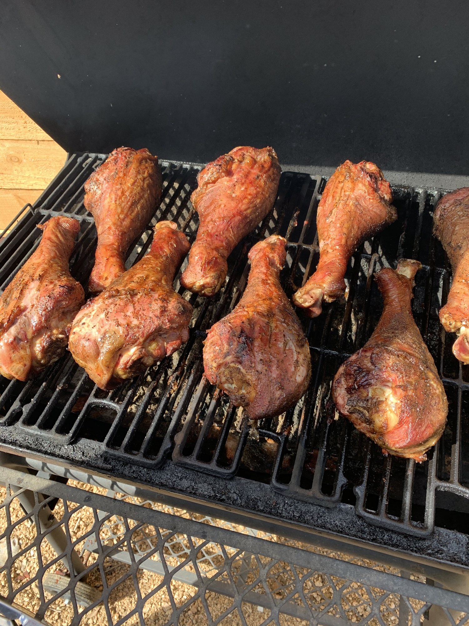 Turkey legs cooking on the grill